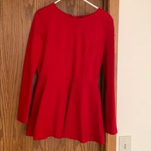 Pepulum top!  Not flimsy heavier fabric